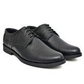 Close-up of the black leather derby shoe showcasing fine craftsmanship.